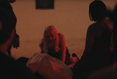 People surround a body