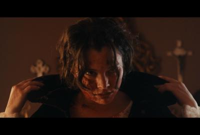 A medium-close of Dawn after her face has been burnt