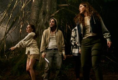 Friends in the woods break from terror