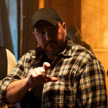 Man directs his actor with blocking. 